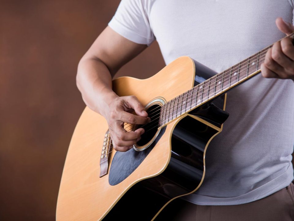 Man playing a guitar